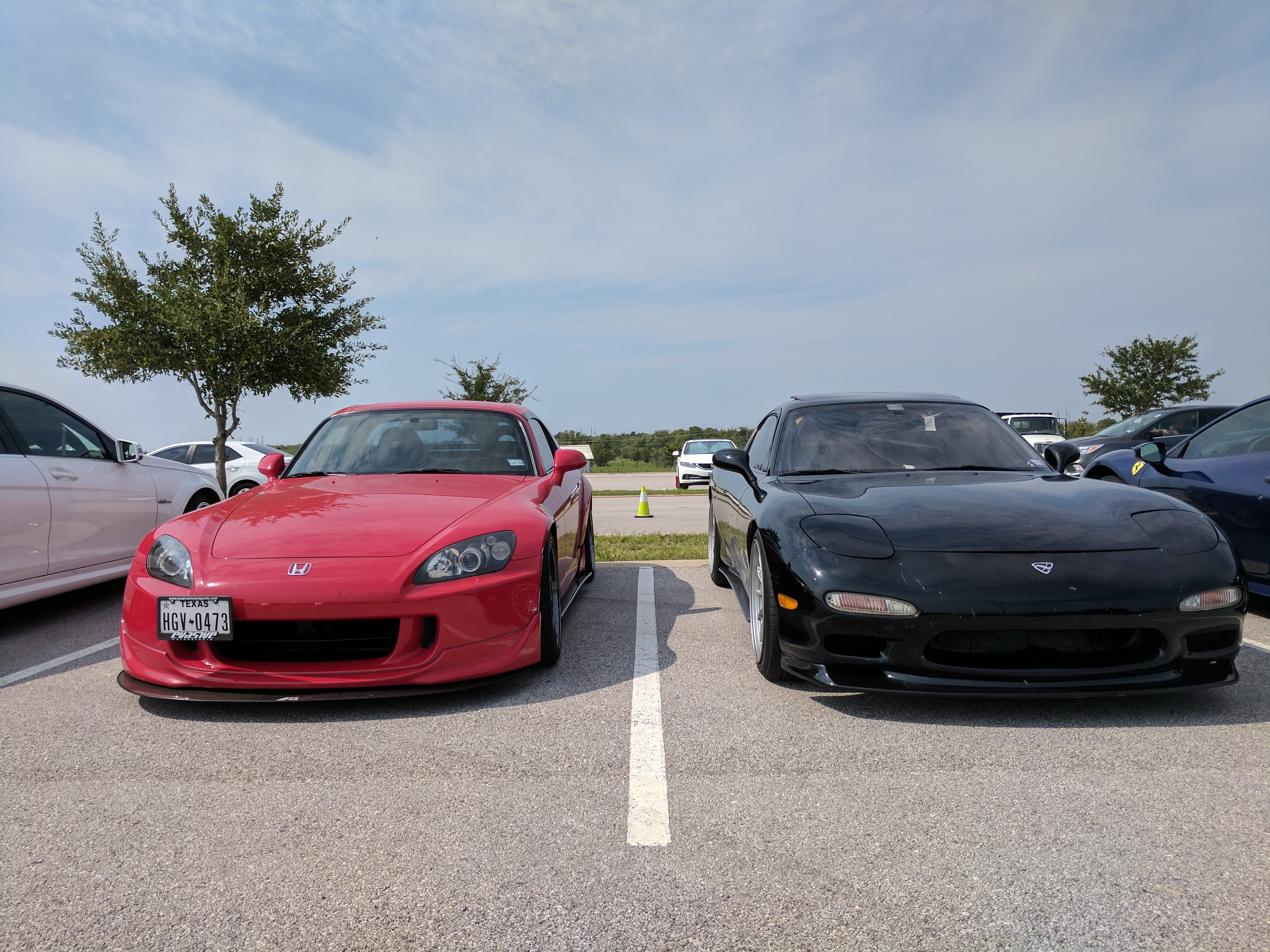 Two takes on the light weight, high RPM sports car.